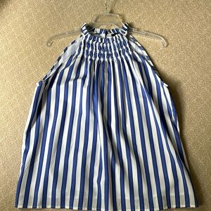 Ann Taylor halter style blue and white stripe top. Smocked front. Button back.